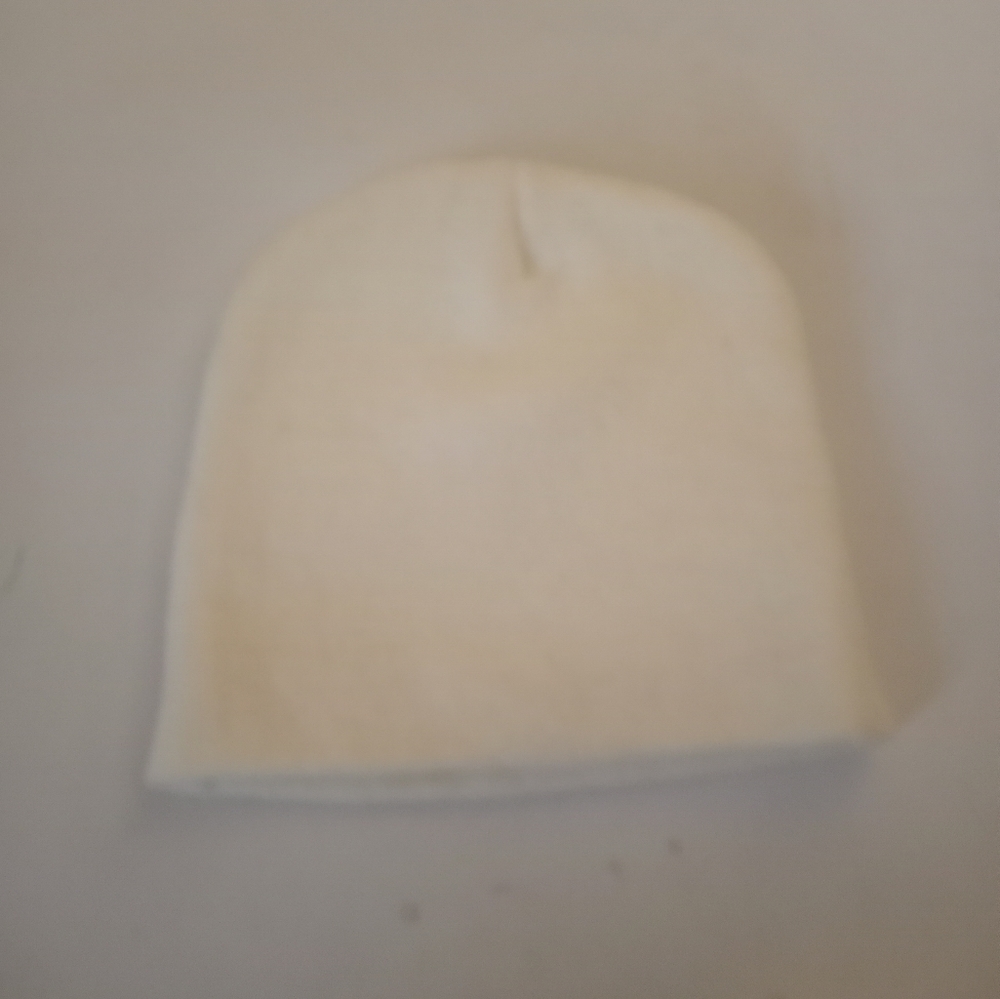 Cream skull cap